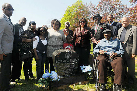 Acel Moore in wheelchair at Reggie Bryant’s grave stone unveiling in 2013. To his left is NABJ founder Les Payne; to his right is Paul Brock, NABJ’s first executive director.    Photo courtesy: NABJ
