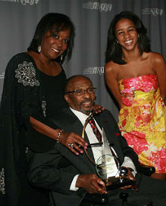 Linda Wright Moore, left, with her husband Acel Moore and their daughter Mariah. Acel was given the Lifetime Achievement Award at the Salute to Excellence Gala during the 2011 National Association of Black Journalists Convention in Philadelphia.   Photo courtesy: NABJ