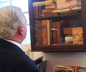 Congressman Brady inspects rare book collection at historic Darby Library.  (Photo Courtesy of Cong. Bob Brady)