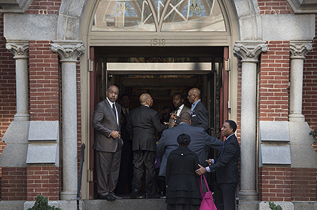 Attendees arrive at Metropolitan A.M.E. Church for the memorial service for journalist Gwen Ifill in Washington, Saturday, Nov. 19, 2016. (AP Photo/Sait Serkan Gurbuz)