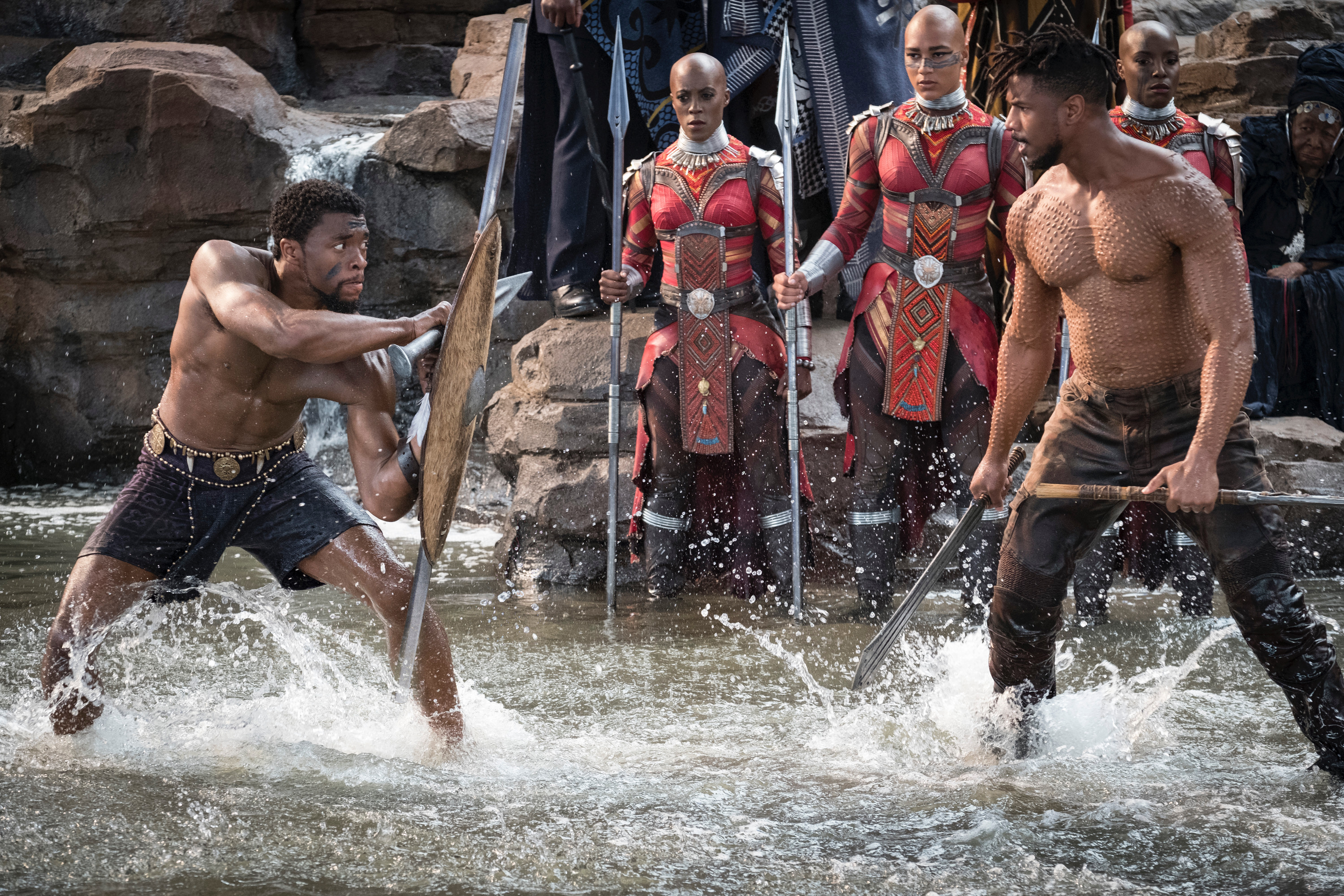 T’Challa/Black Panther (Chadwick Boseman) and Erik Killmonger (Michael B. Jordan) fight as the Dora Milaje look on... Photo: Matt Kennedy..©Marvel Studios 2018